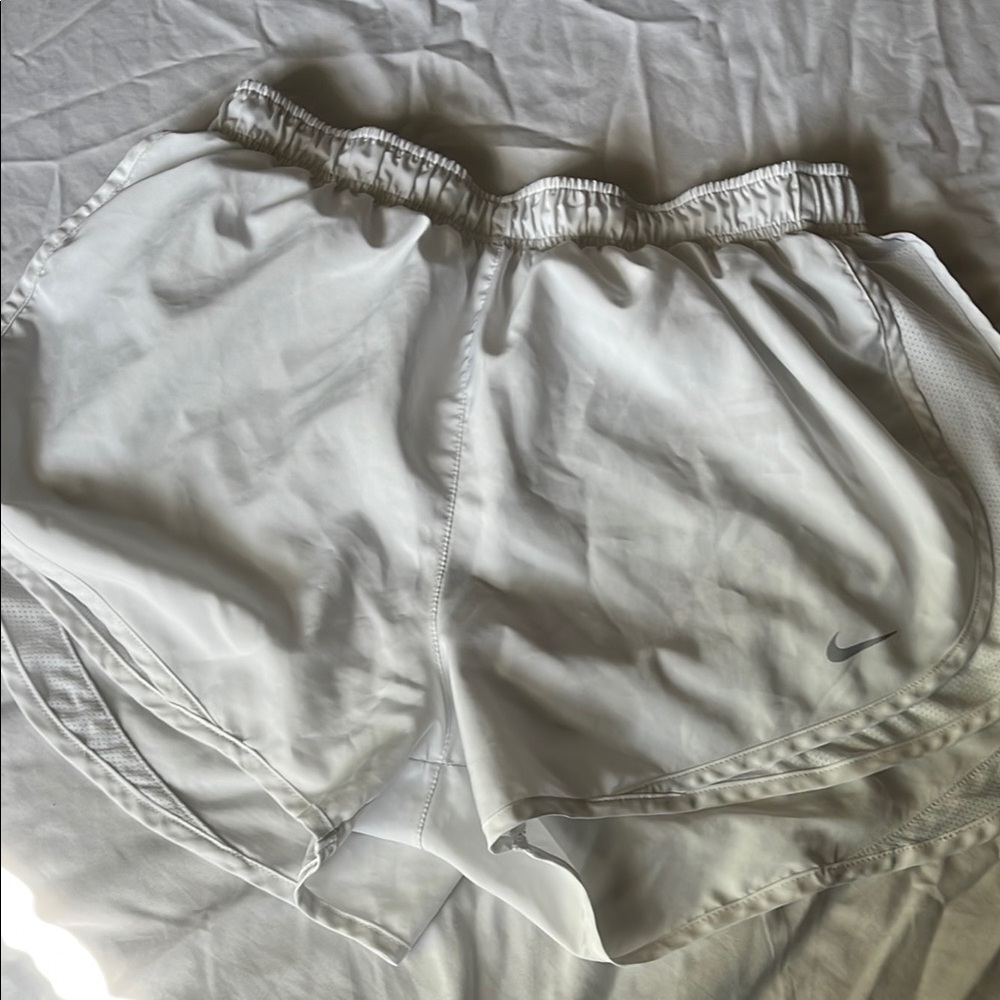 White Nike shorts